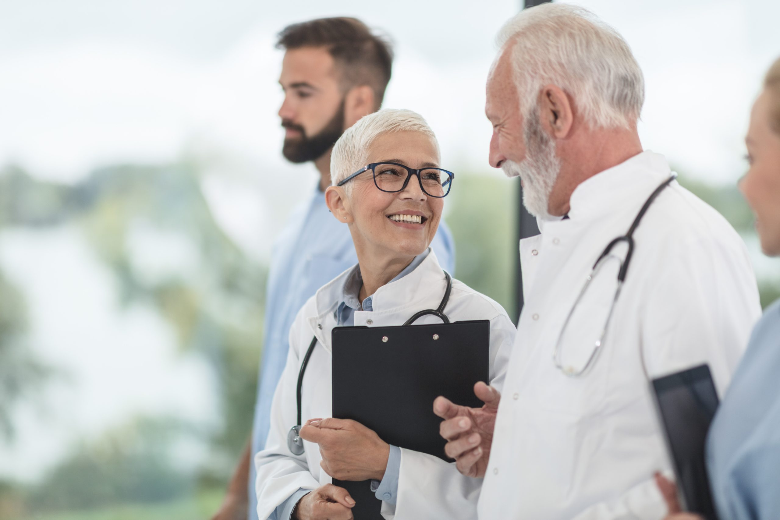medical doctors with staff